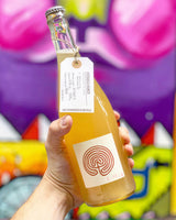 O-X is a natural sparkling wine by Costadila
