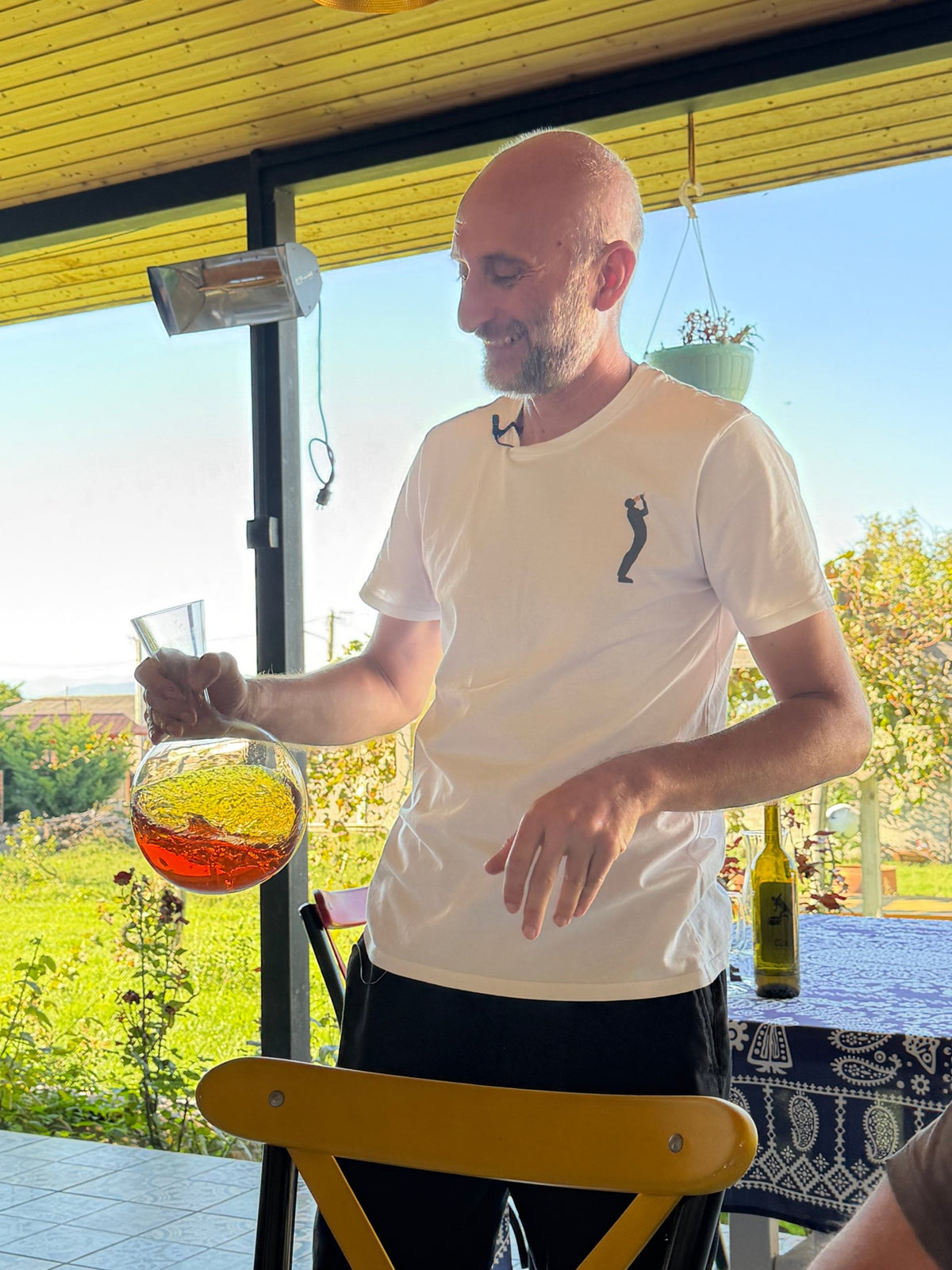 Iago's Wine - the winemaker of Iago's Wine pouring Chinuri at the domaine in Georgia